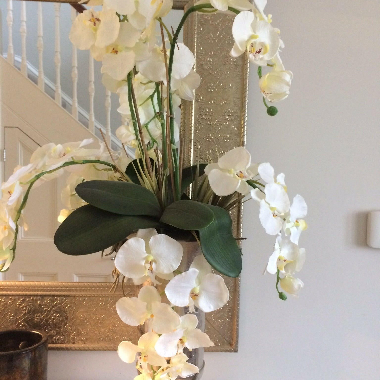 Showing a Bespoke artificial Silk flower arrangement, including the Phalaenopsis, sent in by one of our customers