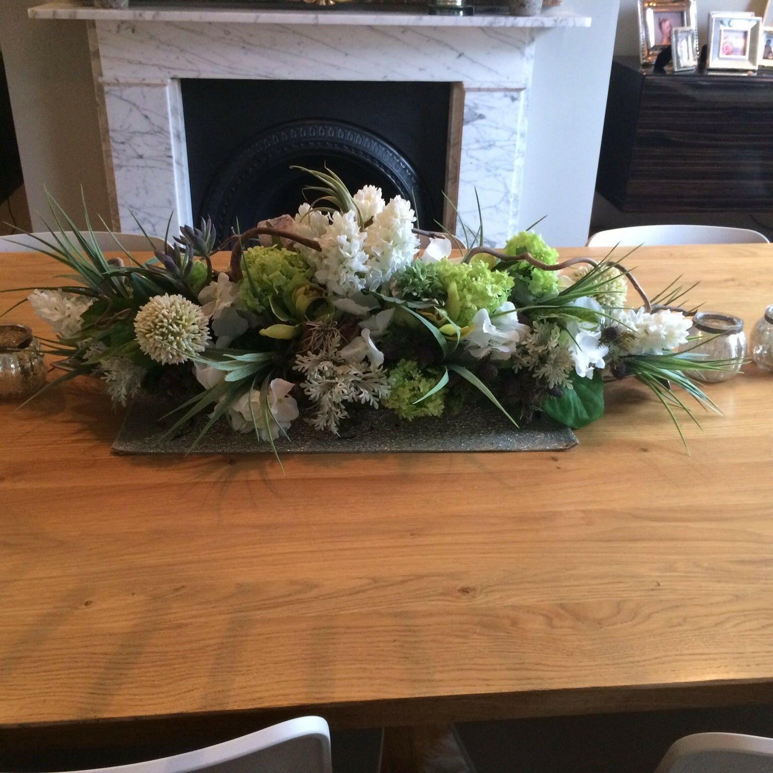 Showing a Bespoke artificial Silk flower arrangement, including the Vanilla Grass, sent in by one of our customers