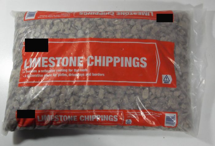 Limestone Chippings - Shown in bag