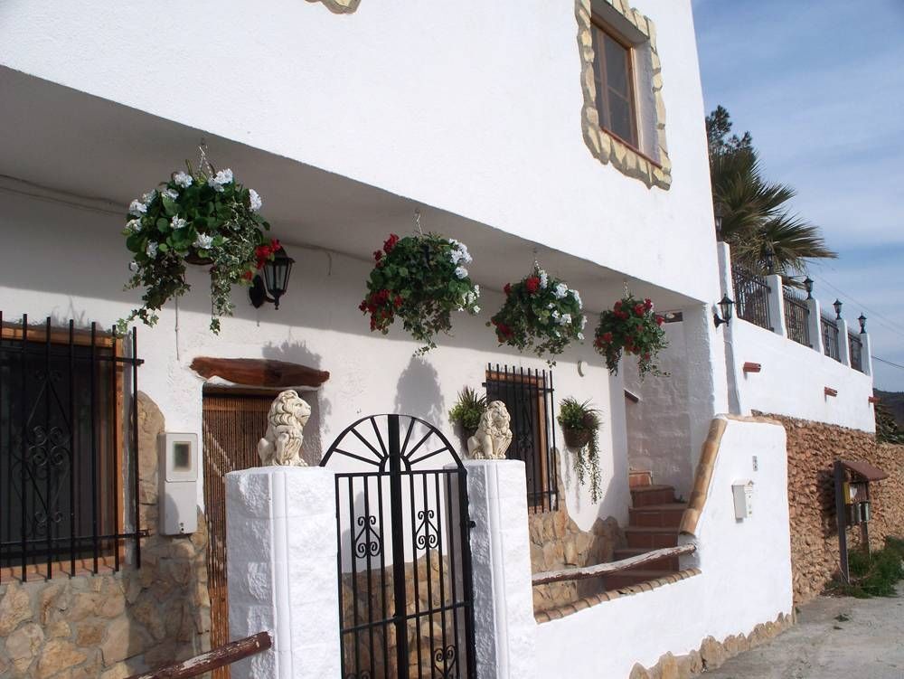 JustArtificial.co.uk supplied some Fake Hanging Baskets to a Spanish Villa