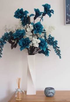 Showing our artificial silk Dragon Flower in an arrangement
